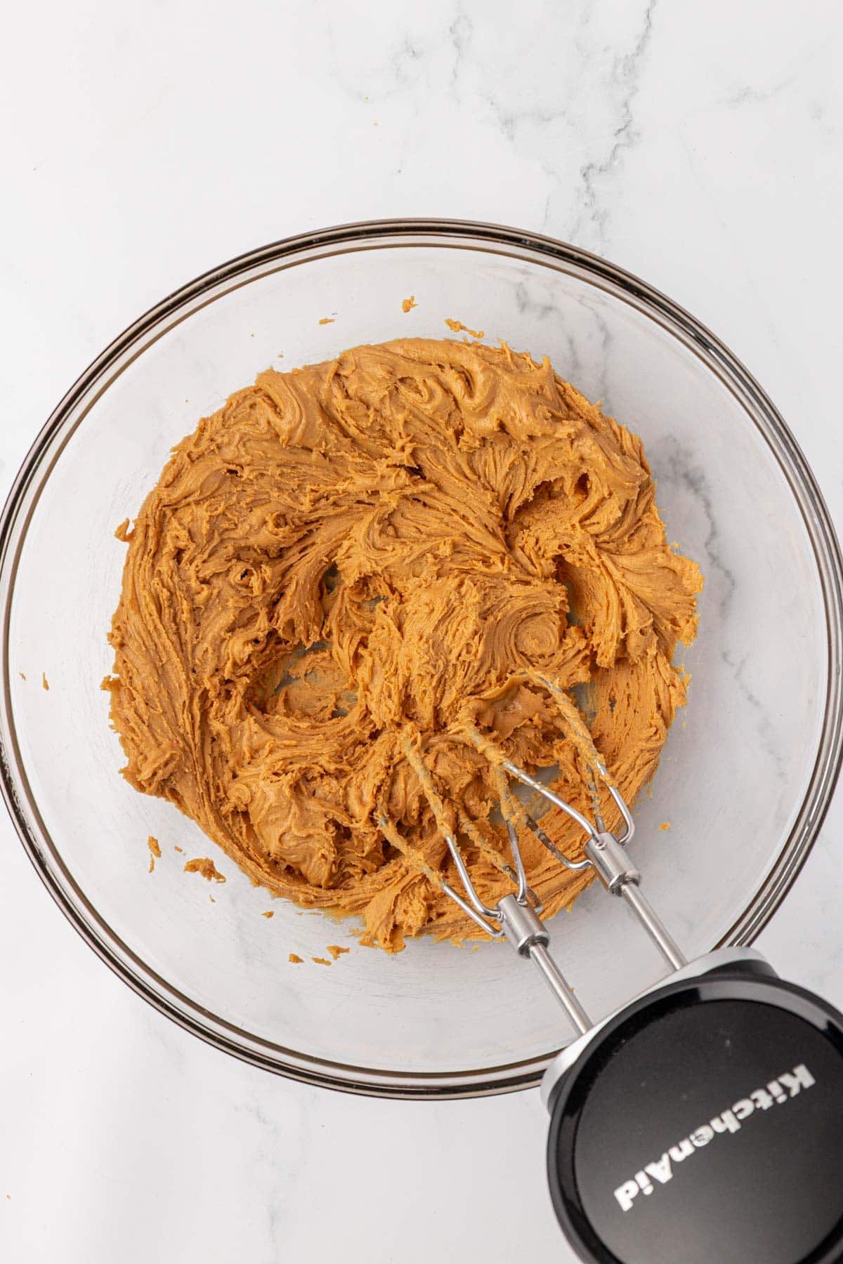 mixing the peanut butter and butter together