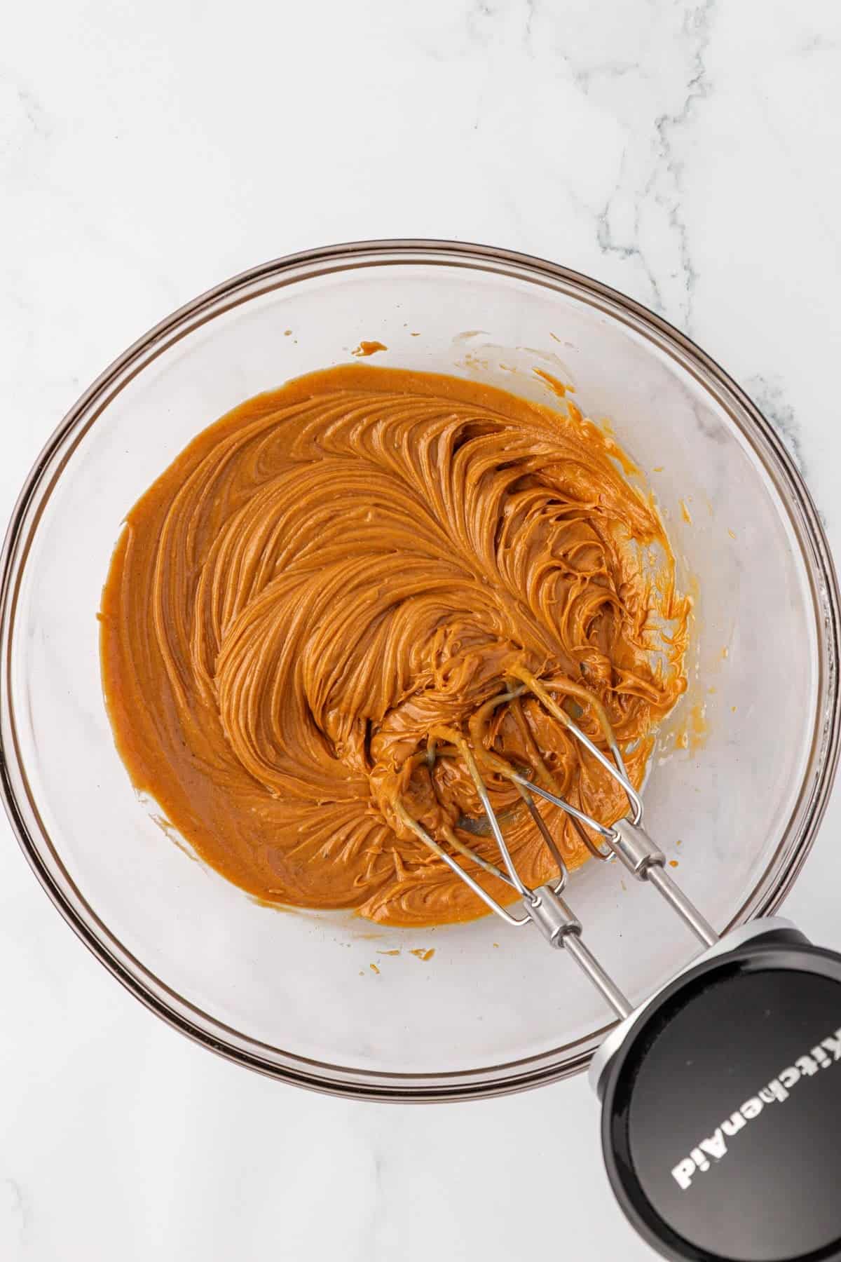 mixing the peanut butter and butter together