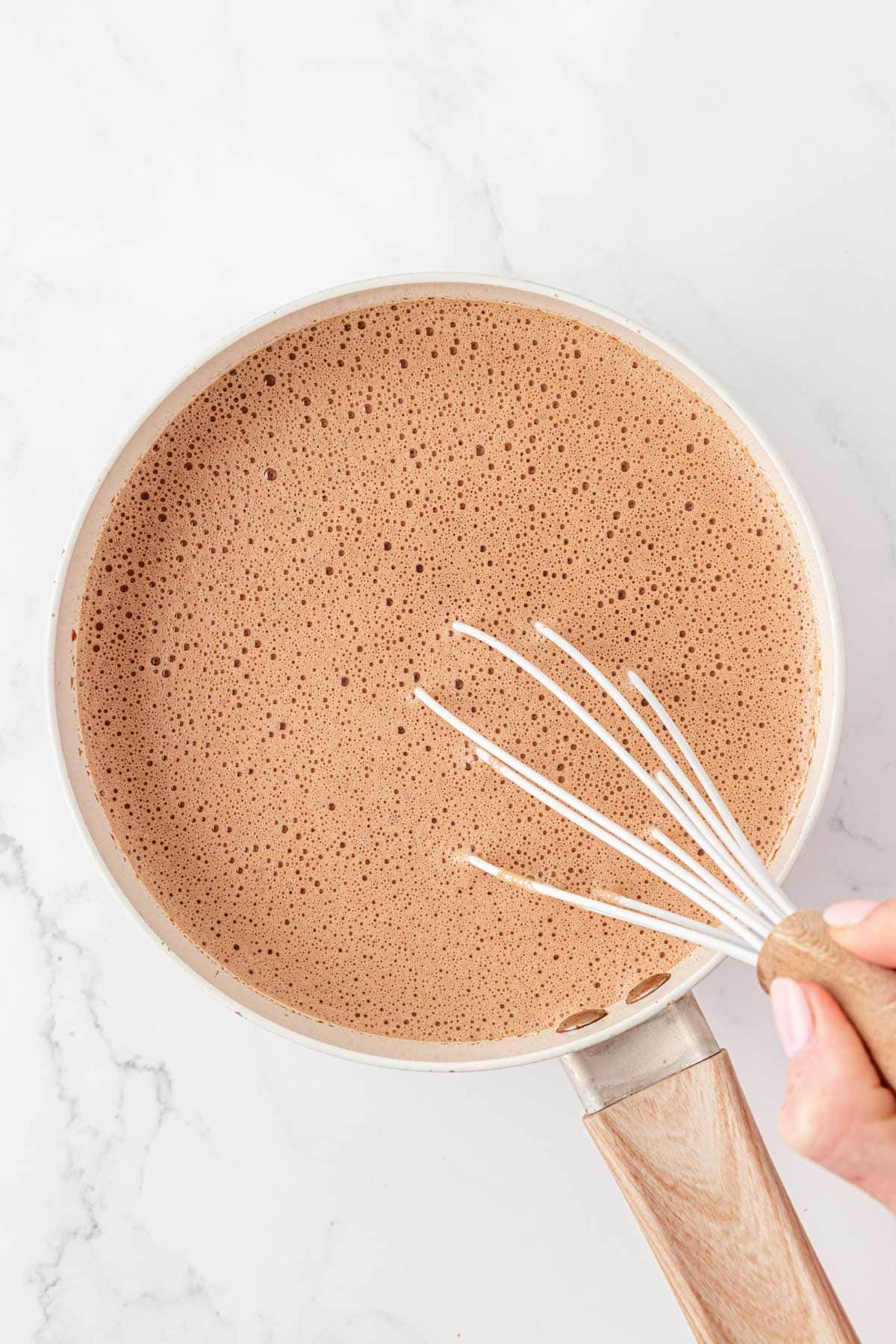 whisking the hot chocolate