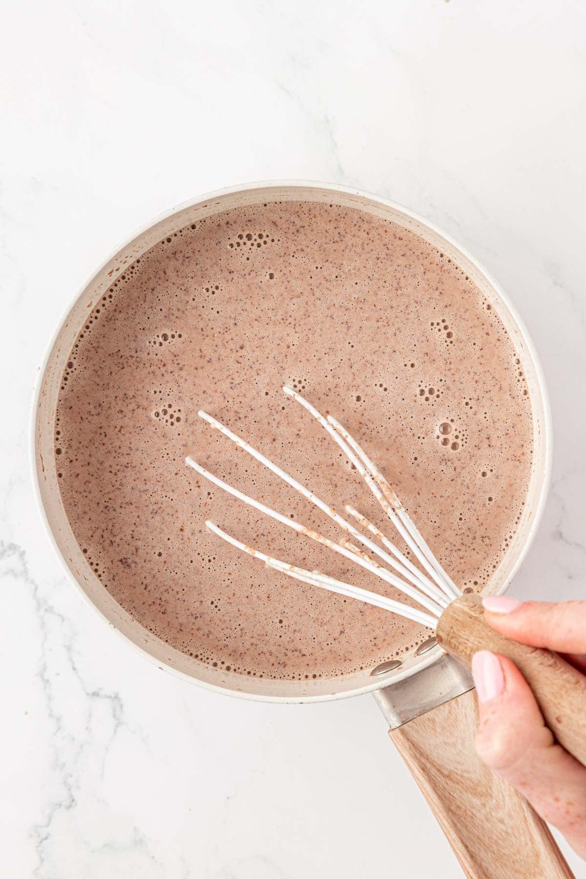 whisking the hot chocolate