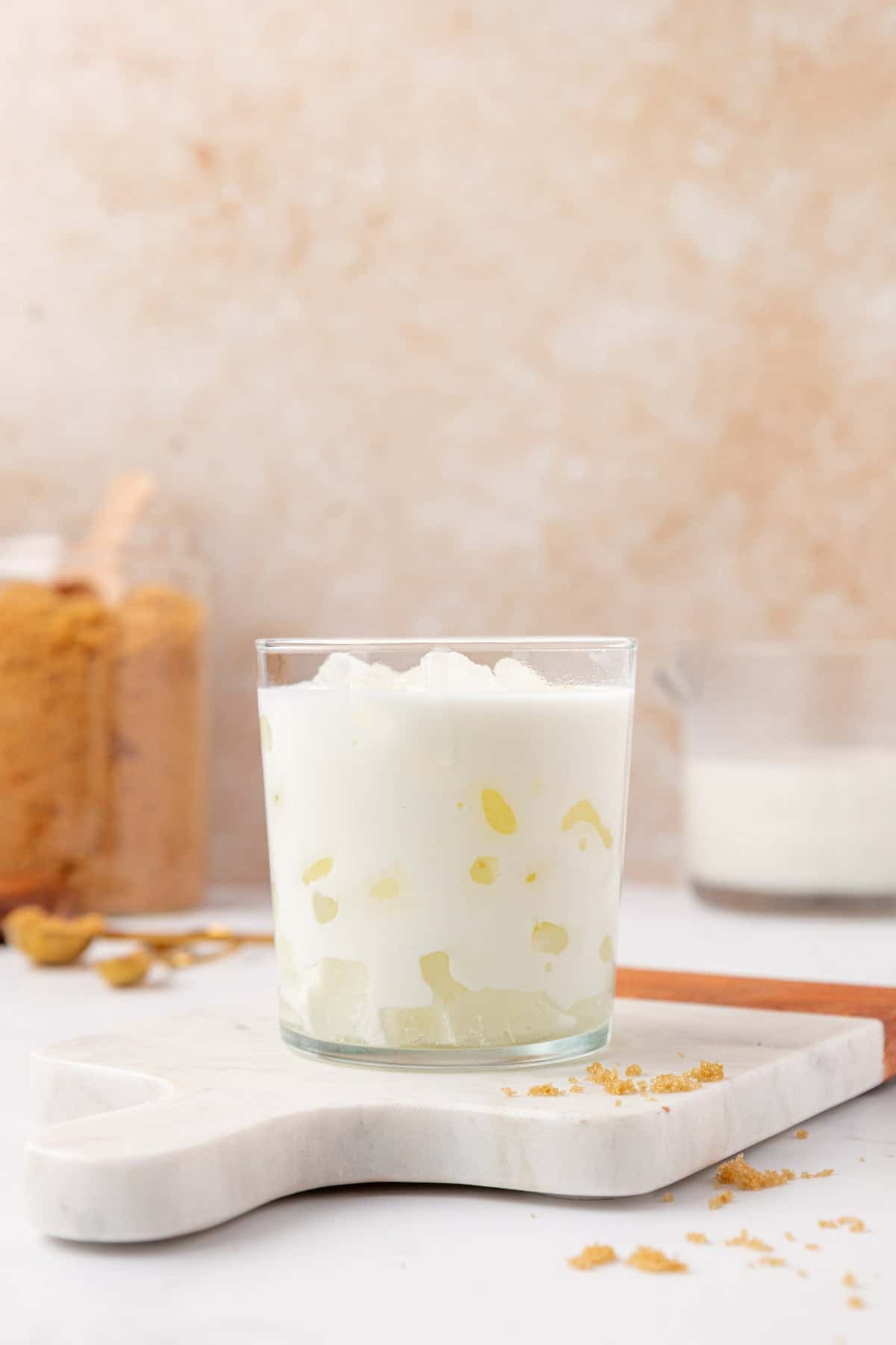 ice and milk in a glass