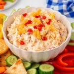 pimento cheese dip with crackers and vegetables
