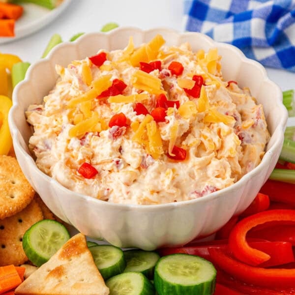 pimento cheese dip with crackers and vegetables