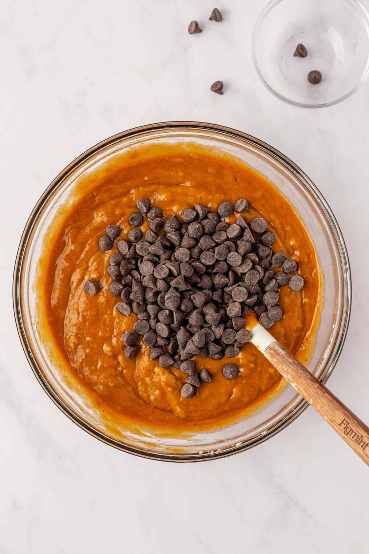 adding the chocolate chips to the batter