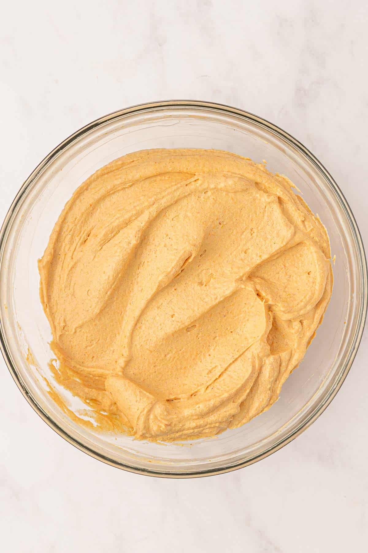 no bake pumpkin cheesecake filling in a mixing bowl