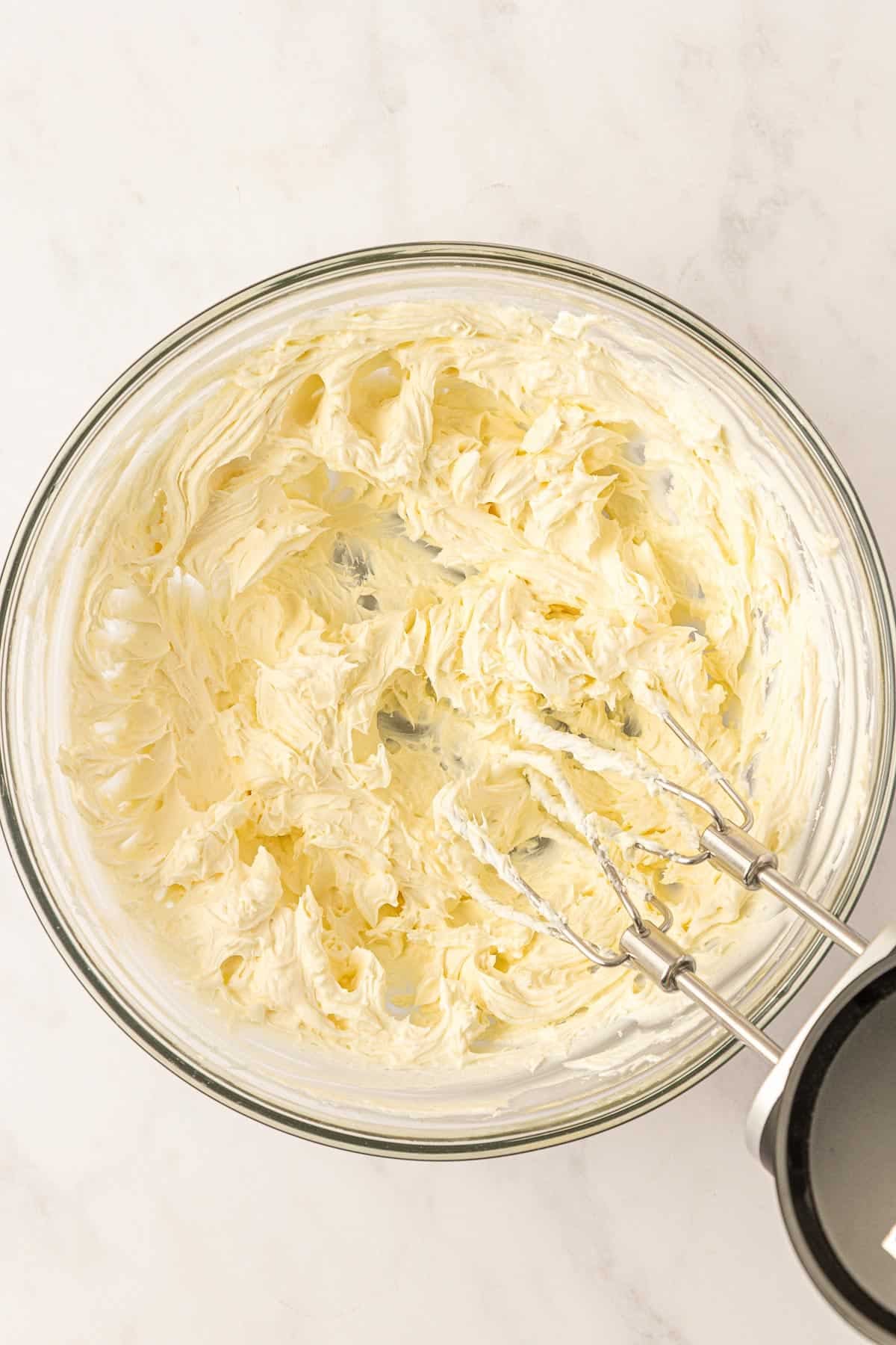 whipped cream cheese in a mixing bowl