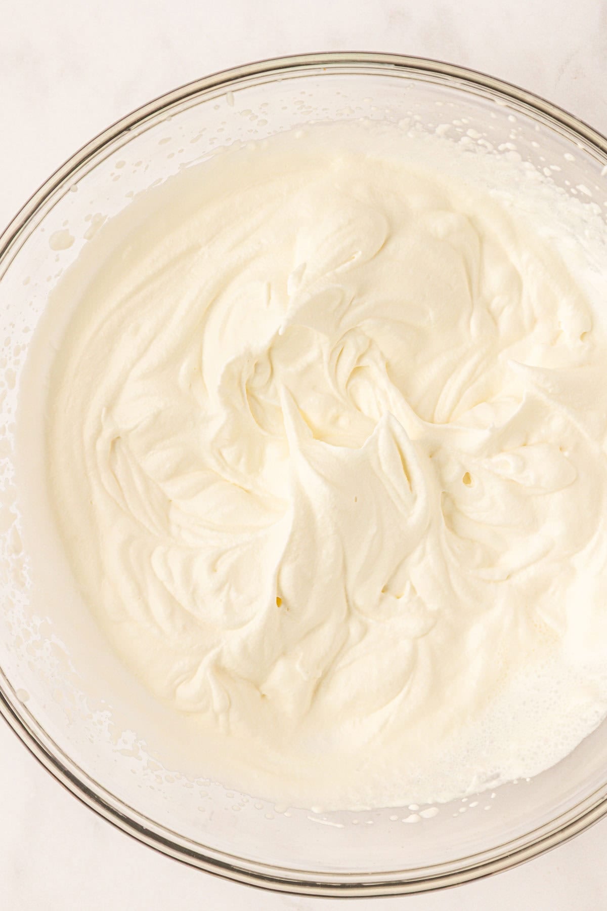 whipped cream in a mixing bowl