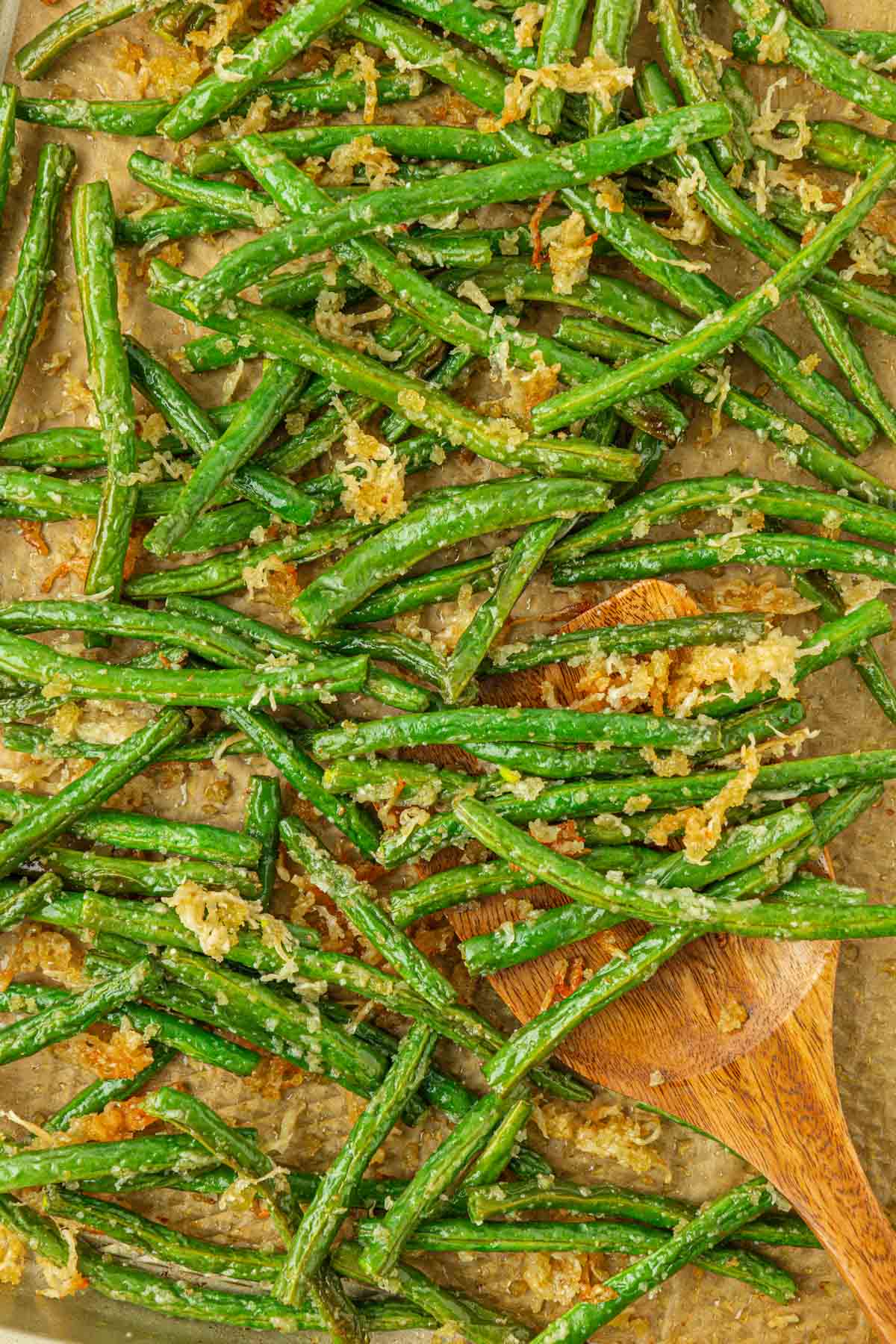 roasted parmesan green beans on a baking sheet