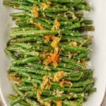 roasted parmesan green beans on a serving platter
